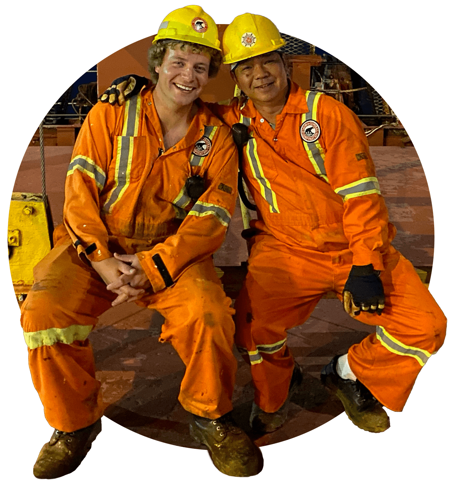 Seafarers posing on board vessel.